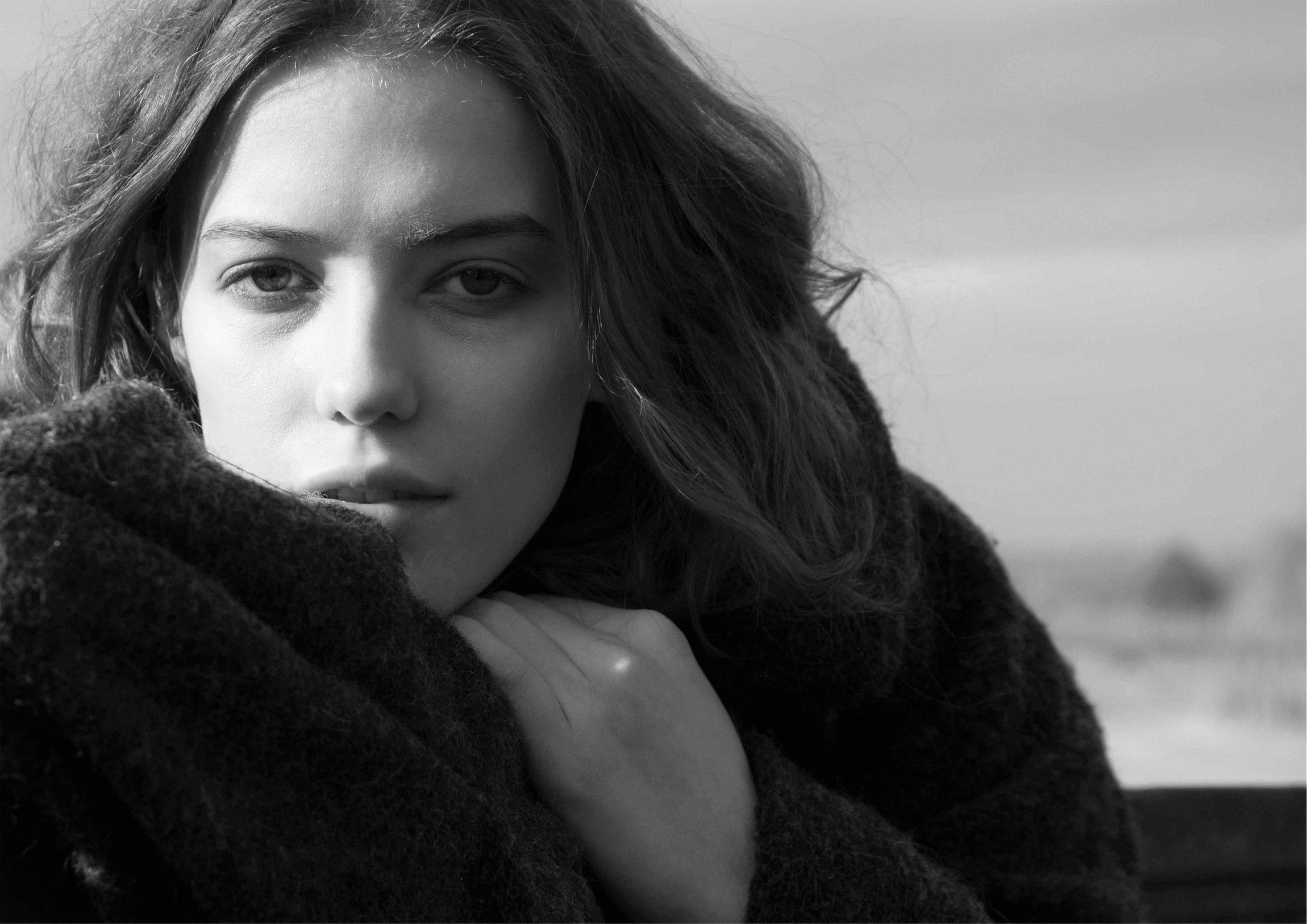 Close portrait in a felted wool coat